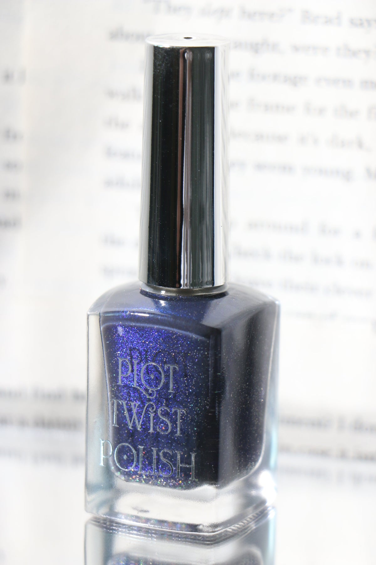A bottle of blue nail polish.